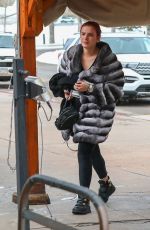 BELLA THORNE and Benjamin Mascolo Arrives at Aspen Airport 12/15/2021