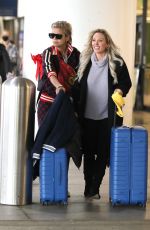 BRAUNWYN WINDHAM-BURKE and VICTORIA BRITO at LAX in Los Angeles 12/30/2021