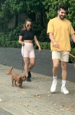 BROOKE BLURTON and Darvid Garayeli Out with Their Dogs in Melbourne 12/17/2021