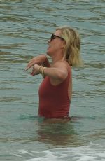 CHARLIZE THERON in Swimsuit on Vacation in Cabo San Lucas 11/27/2021