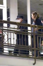 CHARLIZE THERON Leaves a Restaurant with Friends in Los Angeles 12/09/2021
