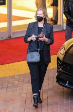 CHARLIZE THERON Shopping at Neiman Marcus in Beverly Hills 12/15/2021