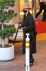 CHARLIZE THERON Shopping at Neiman Marcus in Beverly Hills 12/15/2021