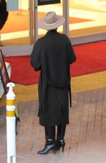CHARLIZE THERON Shopping at Neiman Marcus in Beverly Hills 12/15/2021