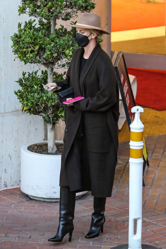 CHARLIZE THERON Shopping at Neiman Marcus in Beverly Hills 12/15/2021
