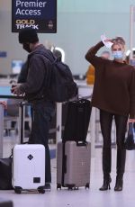 CHARLOTTE MCKINNEY at LAX Airport in Los Angeles 12/30/2021