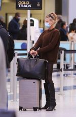 CHARLOTTE MCKINNEY at LAX Airport in Los Angeles 12/30/2021