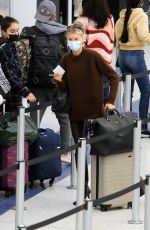 CHARLOTTE MCKINNEY at LAX Airport in Los Angeles 12/30/2021