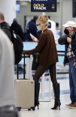 CHARLOTTE MCKINNEY at LAX Airport in Los Angeles 12/30/2021