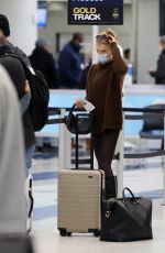 CHARLOTTE MCKINNEY at LAX Airport in Los Angeles 12/30/2021