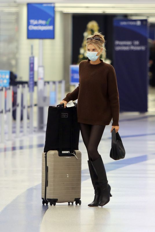CHARLOTTE MCKINNEY at LAX Airport in Los Angeles 12/30/2021