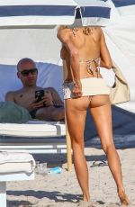 CHARLOTTE MCKINNEY in Bikini on the Beach in Miami 12/05/2021