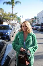 CHRISSY TEIGEN Leaves Lunch in Beverly Hills 12/17/2021