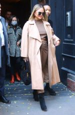 CHRISSY TEIGEN Shopping at FAO Schwarz in New York 12/03/2021