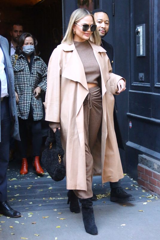 CHRISSY TEIGEN Shopping at FAO Schwarz in New York 12/03/2021