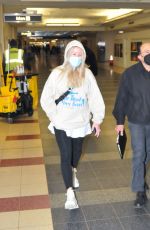 ELLIE GOULDING Arrives at Airport in Washington DC 12/05/2021