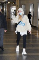 ELLIE GOULDING Arrives at Airport in Washington DC 12/05/2021