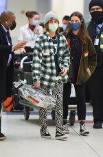 EMMA WATSON Arrives at JFK Airport in New York 12/29/2021