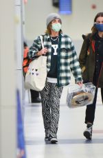 EMMA WATSON Arrives at JFK Airport in New York 12/29/2021