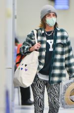 EMMA WATSON Arrives at JFK Airport in New York 12/29/2021