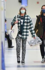 EMMA WATSON Arrives at JFK Airport in New York 12/29/2021