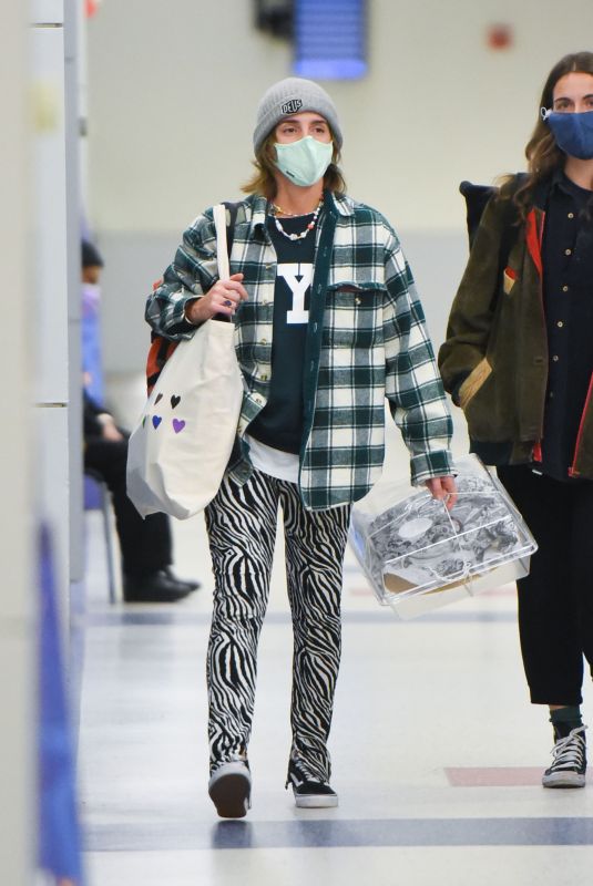 EMMA WATSON Arrives at JFK Airport in New York 12/29/2021