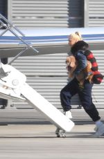 GWEN STEFANI Boards a Private Jet in Los Angeles 12/26/2021