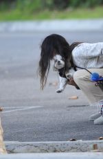 JAMIE CHUNG Picks Up After Her Dog at a Dog Park in Los Angeles 12/03/2021