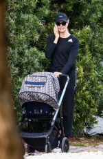 KARLIE KLOSS Out with Her Baby in Miami Beach 12/16/2021