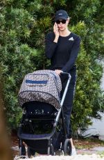 KARLIE KLOSS Out with Her Baby in Miami Beach 12/16/2021