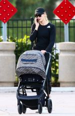 KARLIE KLOSS Out with Her Baby in Miami Beach 12/16/2021