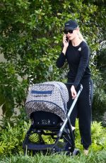 KARLIE KLOSS Out with Her Baby in Miami Beach 12/16/2021