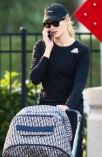 KARLIE KLOSS Out with Her Baby in Miami Beach 12/16/2021