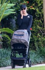 KARLIE KLOSS Out with Her Baby in Miami Beach 12/16/2021