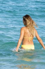 KELLY BENSIMON in a Yellow Bikini Out at a Beach in Miami 12/04/2021