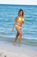 KELLY BENSIMON in a Yellow Bikini Out at a Beach in Miami 12/04/2021