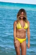 KELLY BENSIMON in a Yellow Bikini Out at a Beach in Miami 12/04/2021