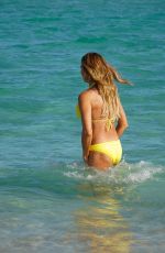 KELLY BENSIMON in a Yellow Bikini Out at a Beach in Miami 12/04/2021