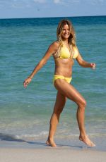 KELLY BENSIMON in a Yellow Bikini Out at a Beach in Miami 12/04/2021