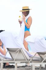 KIMBERLEY GARNER in Swimsuit at a Beach in Miami 12/18/2021