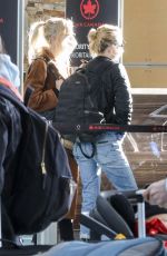 KRISTEN STEWART and DYLAN MEYER Arrives at Airport in Vancouver 12/21/2021