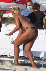 MARY J. BLIGE in Bikini at a Beach in Miami 12/10/2021