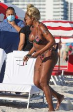 MARY J. BLIGE in Bikini at a Beach in Miami 12/10/2021