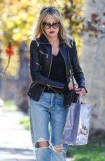 MELANIE GRIFFITH in Ripped Denim and Leather Jacket Out in Beverly Hills 12/11/2021