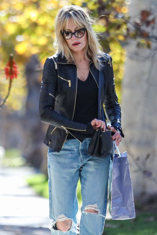 MELANIE GRIFFITH in Ripped Denim and Leather Jacket Out in Beverly Hills 12/11/2021