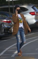 MILA KUNIS in Ripped Denim Heading to a Meeting in Beverly Hills 12/01/2021