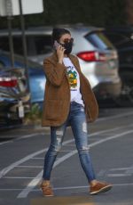 MILA KUNIS in Ripped Denim Heading to a Meeting in Beverly Hills 12/01/2021