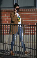 MILA KUNIS in Ripped Denim Heading to a Meeting in Beverly Hills 12/01/2021