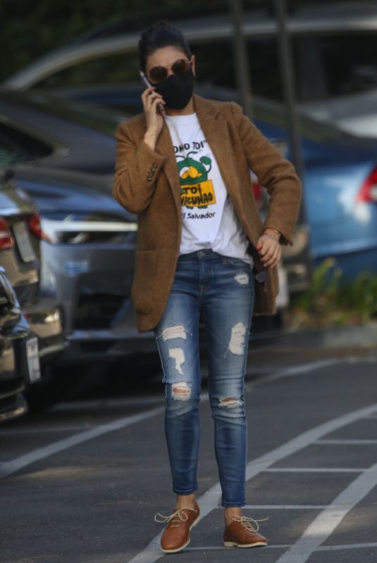 MILA KUNIS in Ripped Denim Heading to a Meeting in Beverly Hills 12/01/2021