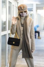 MILEY CYRUS Arrives at JFK Airport in New York 12/12/2021